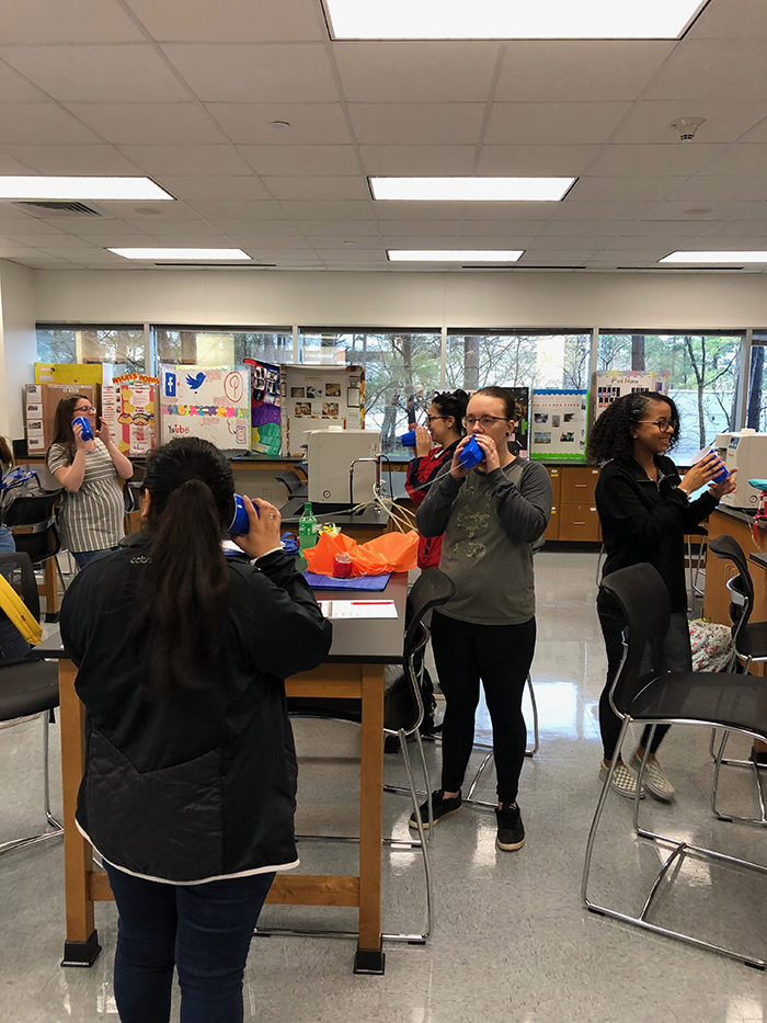 PSTs follow the same process that their elementary students would in testing different types of string-cup phones. Photo by Allison Bott – NASA Office of STEM Engagement.