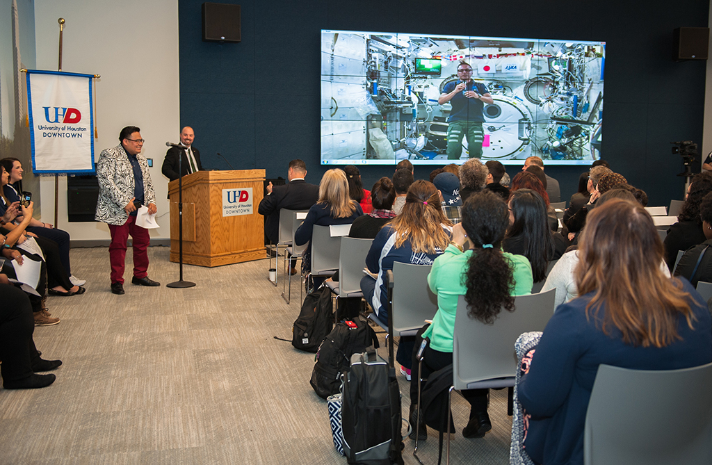 Astronaut Joseph Acaba, aboard the International Space Station, answers a question from a UHD preservice teacher during the educational downlink. Photo by Mike Emery – University of Houston-Downtown Communications Advancement and University Relations.