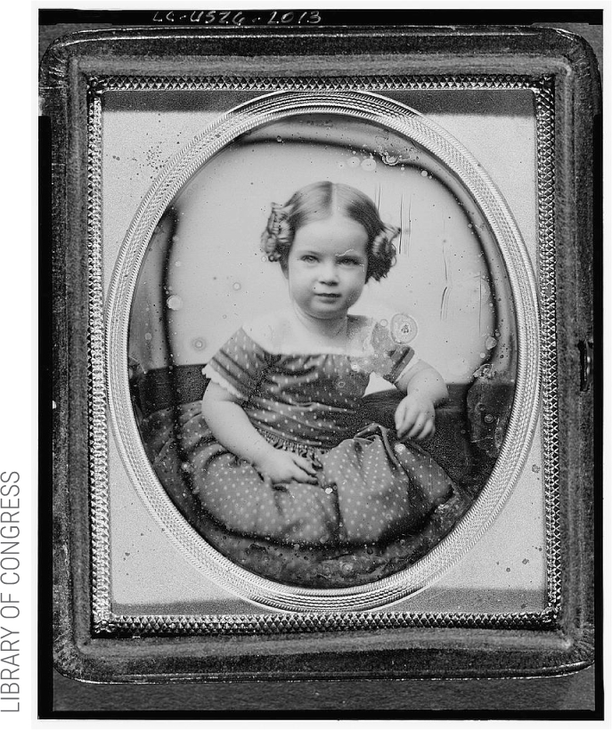 Mabel Hubbard, half-length portrait of a girl, facing front, seated, 1860. https://www.loc.gov/item/2004664323/