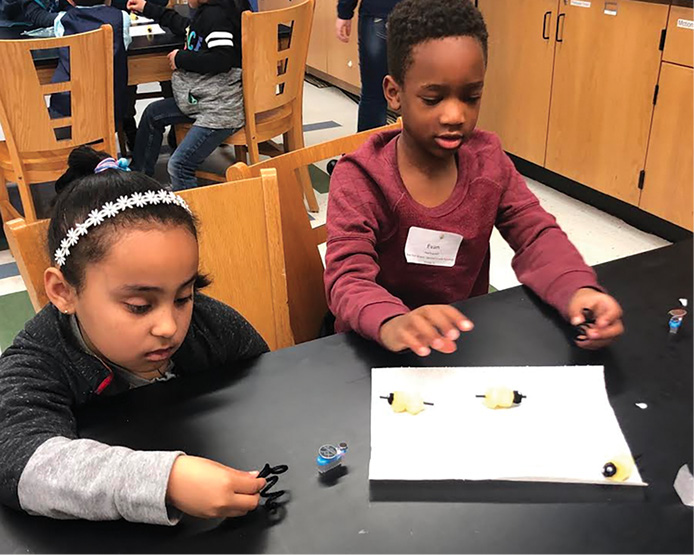 Students decorate their bees after assembling and balancing their brush bot. 