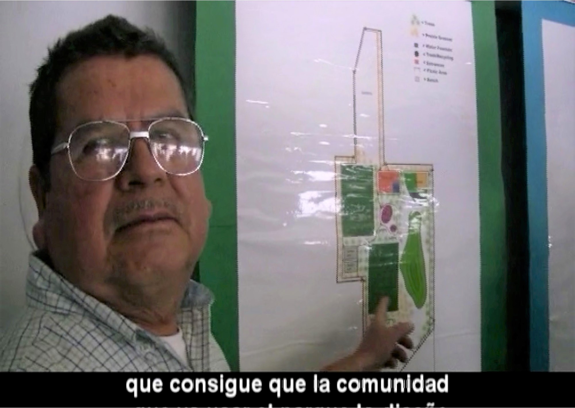 Figure 4. Community member presenting community-based designs for the CELOTEX site. Screenshot from Celotex documentary released by LVEJO