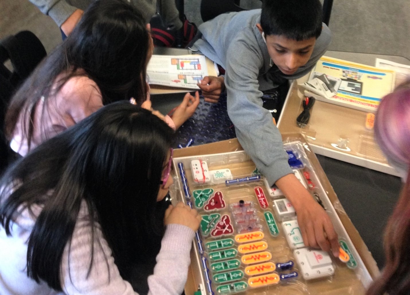 Youth work with circuits during 4-H Science Club in the SUN afterschool program 