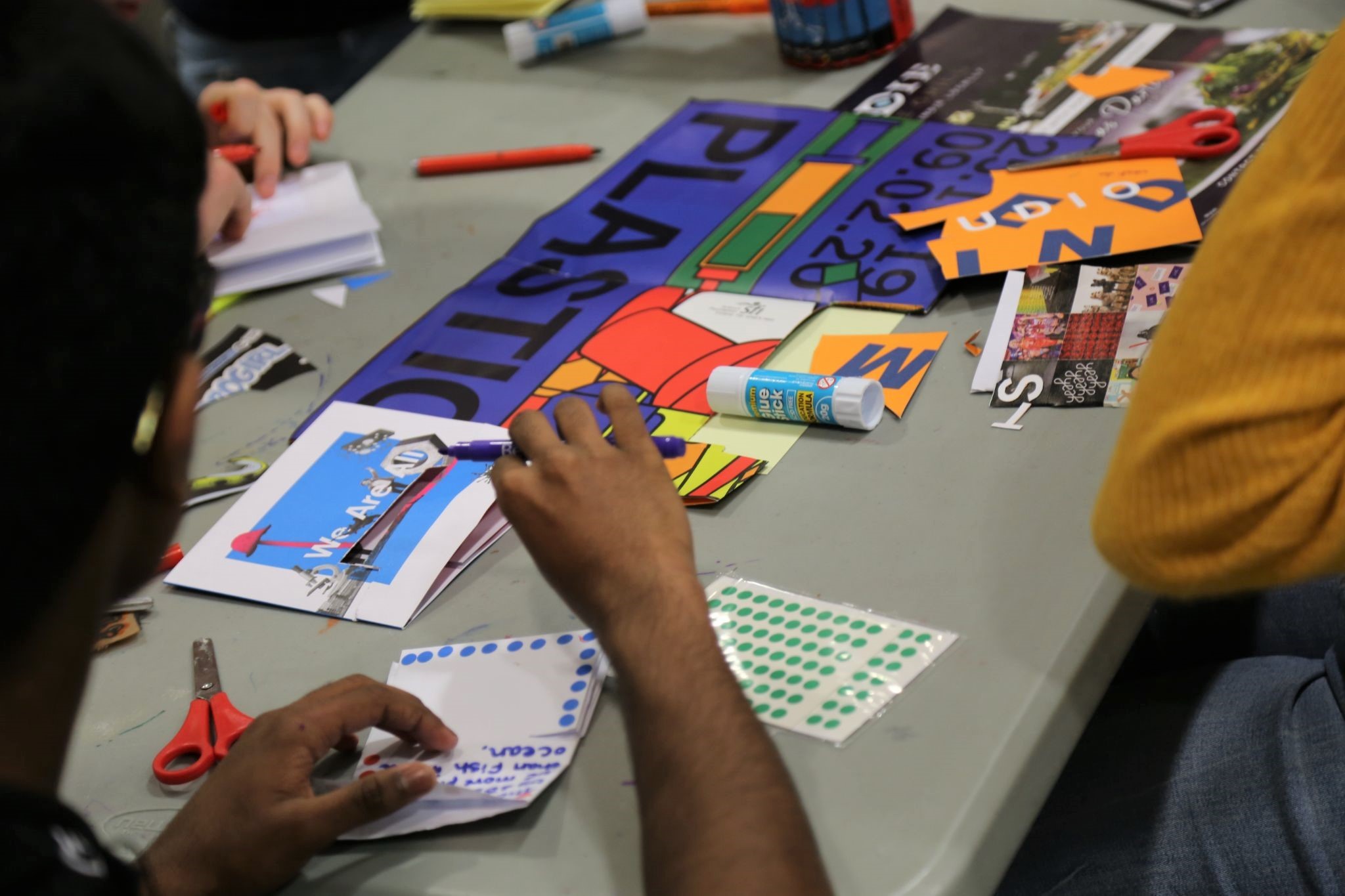 Young people in the OPEN MIND Studio create zines to reflect on the day’s learning about human relationships to plastics.  