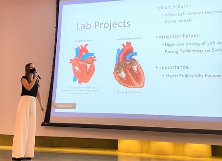 Student presenting heart research 