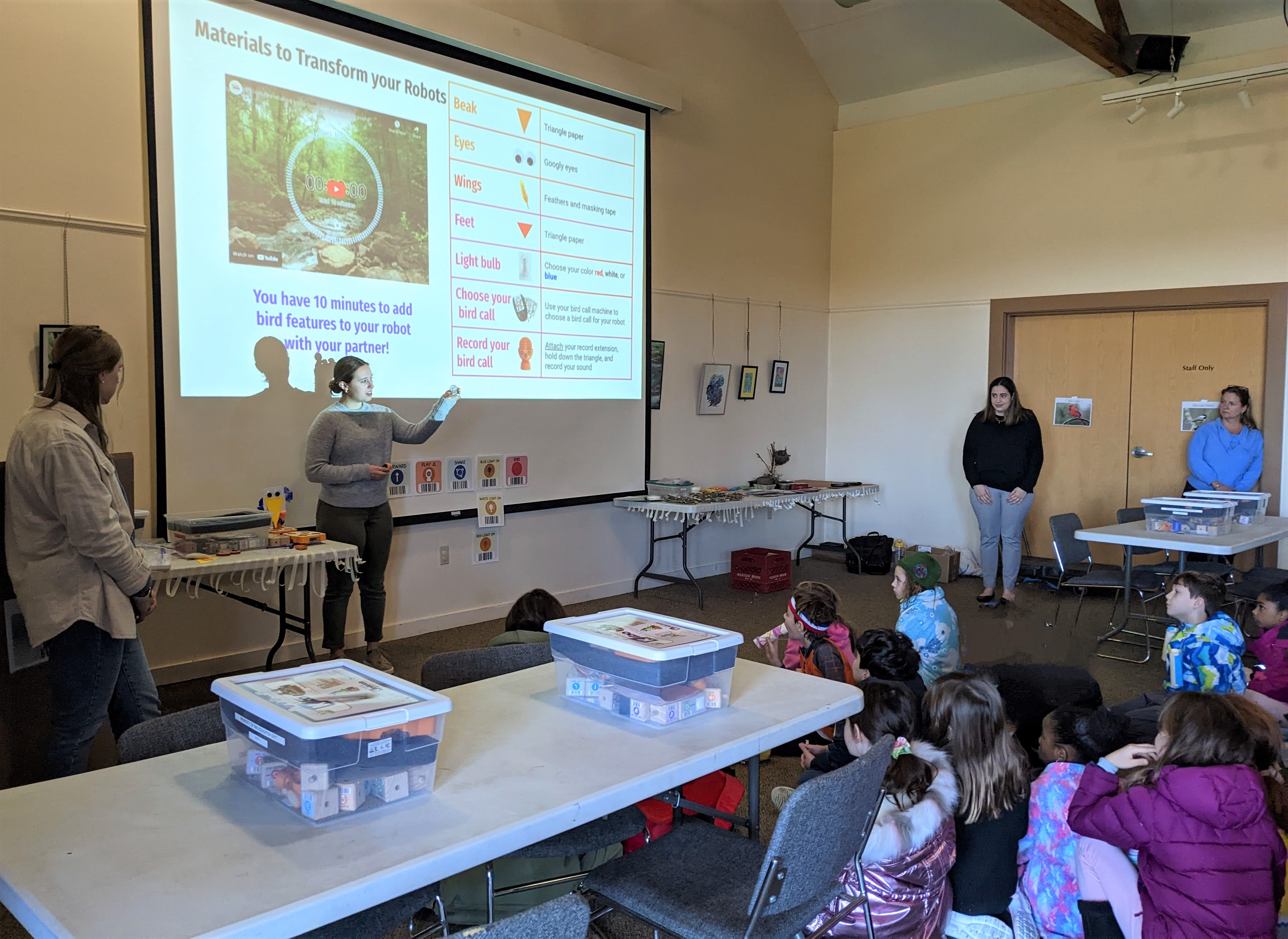 Figure 10. Preservice teacher explaining the robotics challenges to the class of second graders