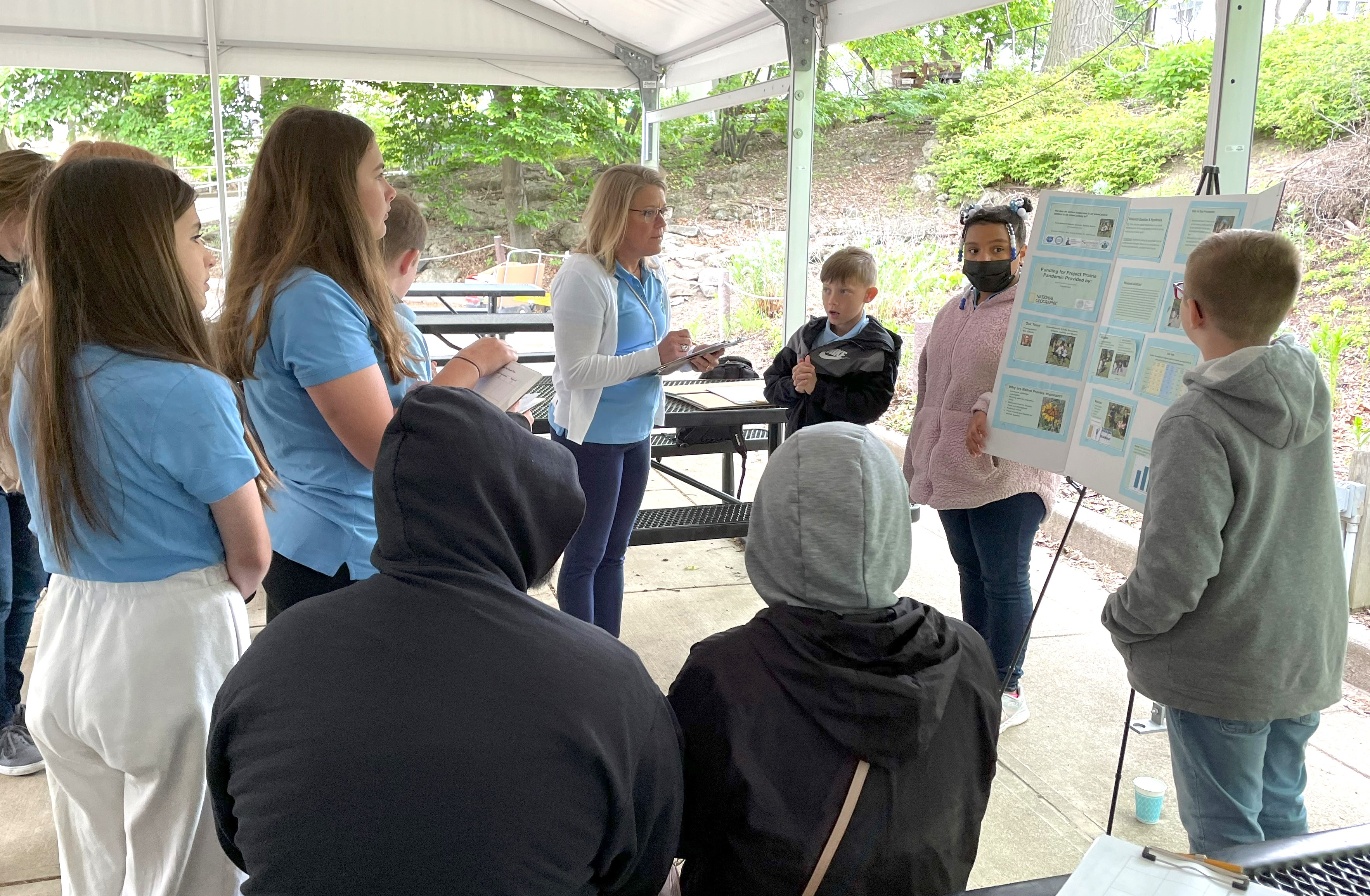 Students present their research at the Project Prairie & GLOBE Local SRS, Toledo Zoo & Aquarium in Toledo, Ohio.