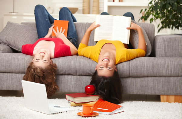 women reading upside down