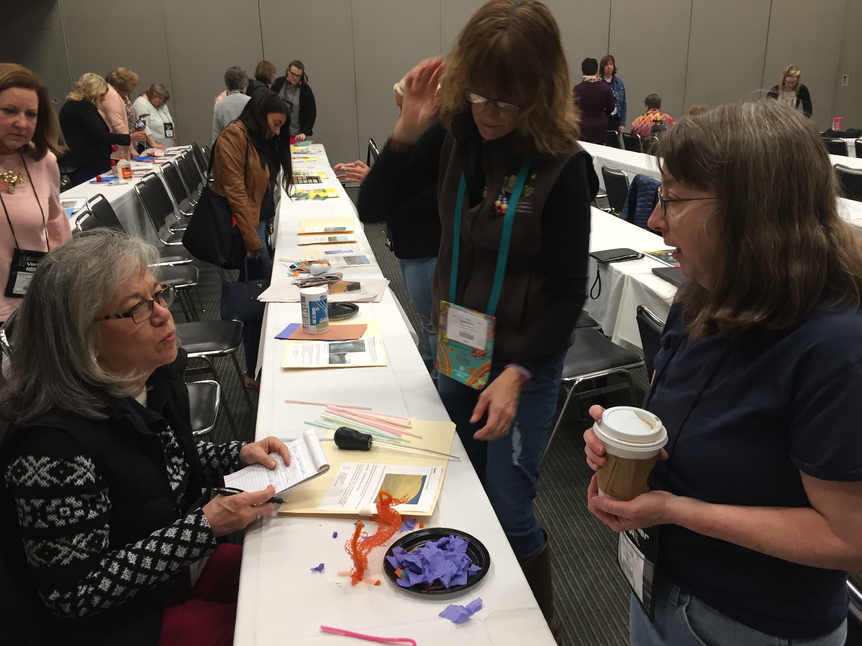 People engaged in the Geology Rocks! session on early childhood science learning.