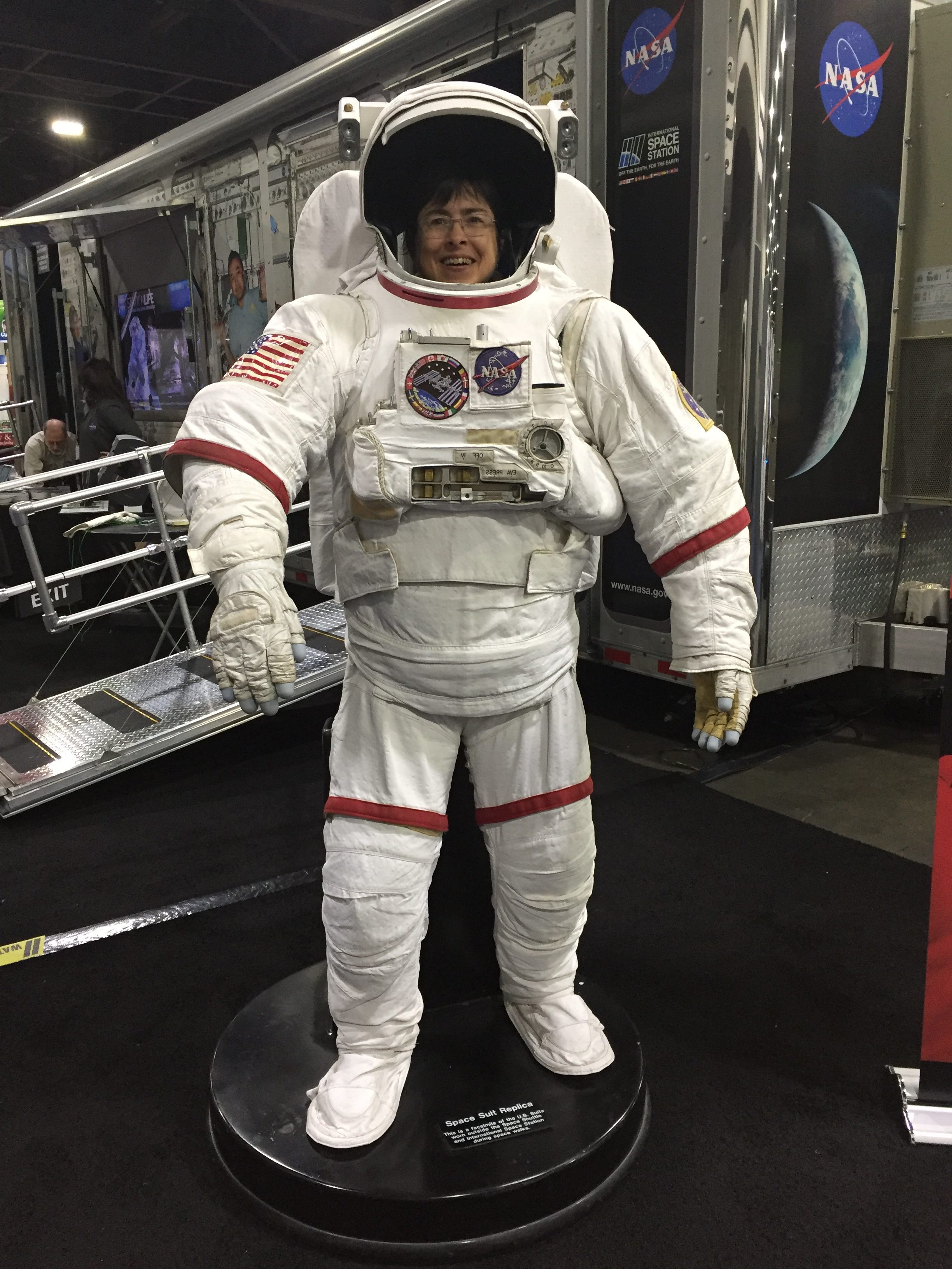 Peggy Ashbrook inside astronaut spacesuit.