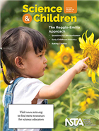 Cover of October 2018 Science & Children. Child looking at sunflowers