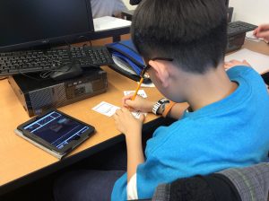 A student participates in an investigation.