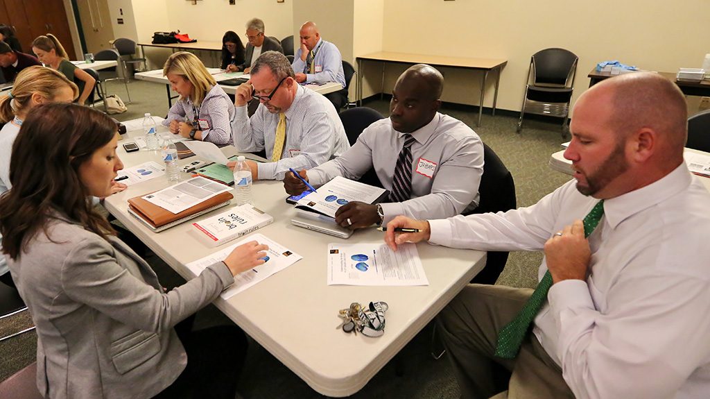 Teachers participate in workshops about understanding the brain.