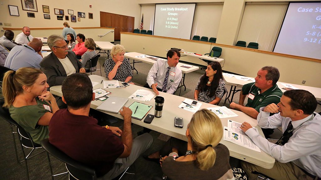 Teachers participate in workshops about understanding the brain.