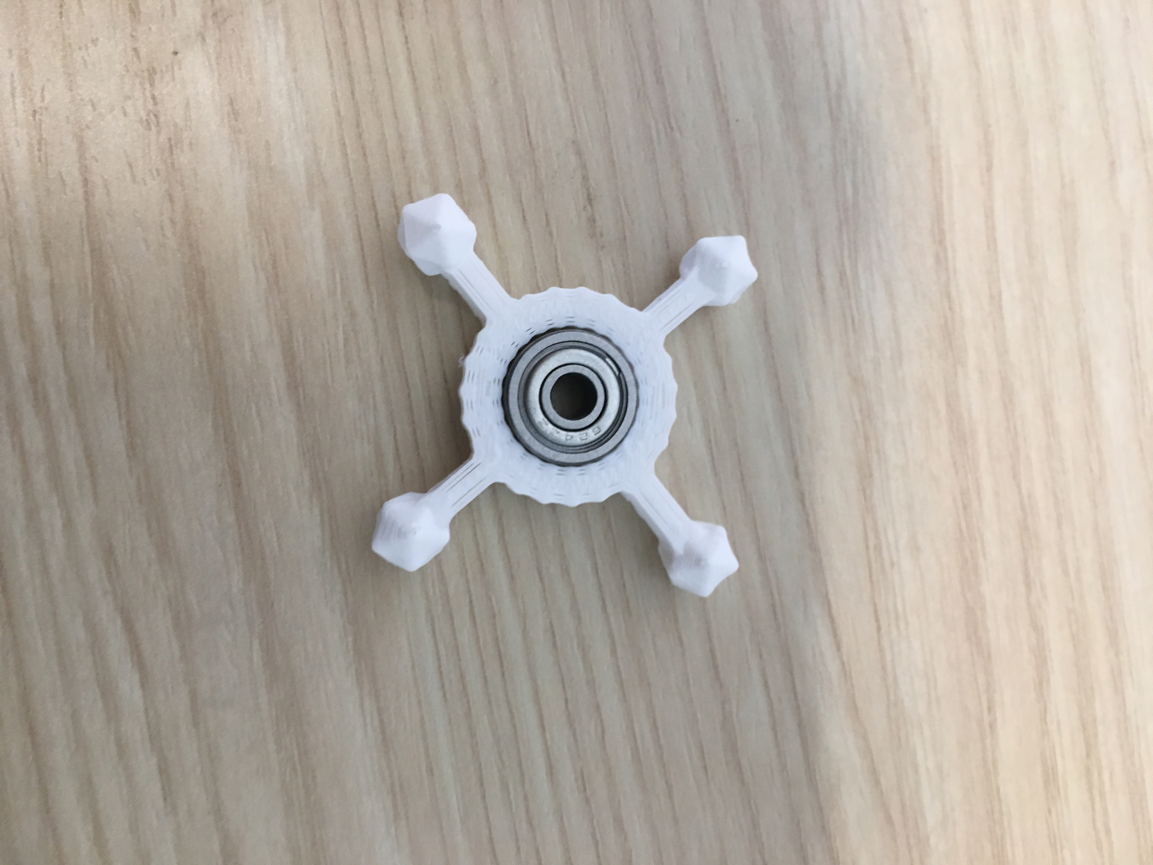 A final fidget spinner created by a seventh-grade boy. This fidget was the only design to print correctly at MOXI.