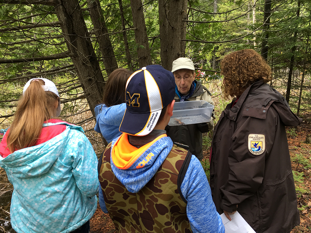 Students work with U.S. Fish and Wildlife Service staff and community volunteers to collect data for the Michigan Natural Features Inventory.