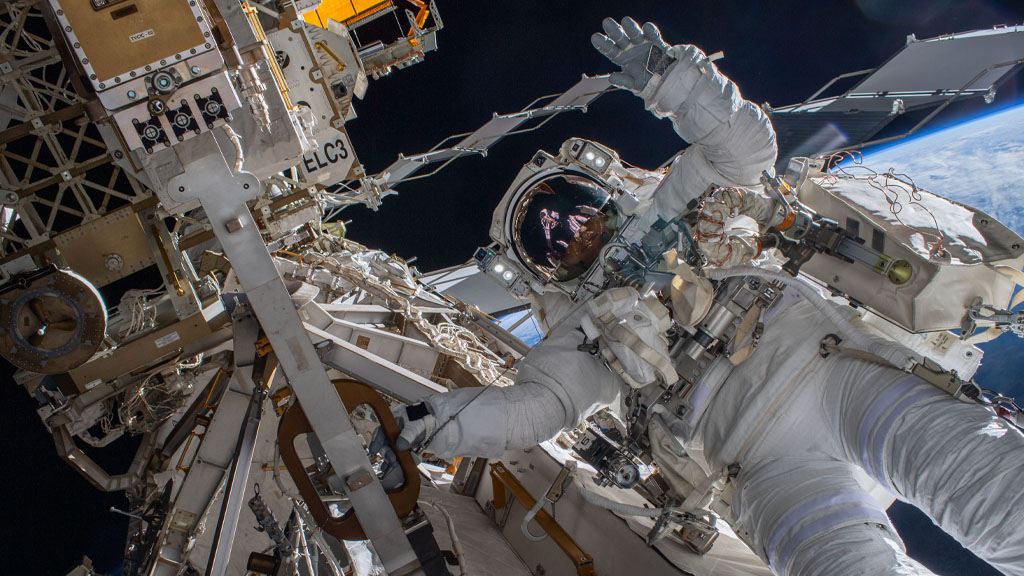 How can we use AI to monitor and provide feedback on an astronaut’s health when communication with mission control is not possible?