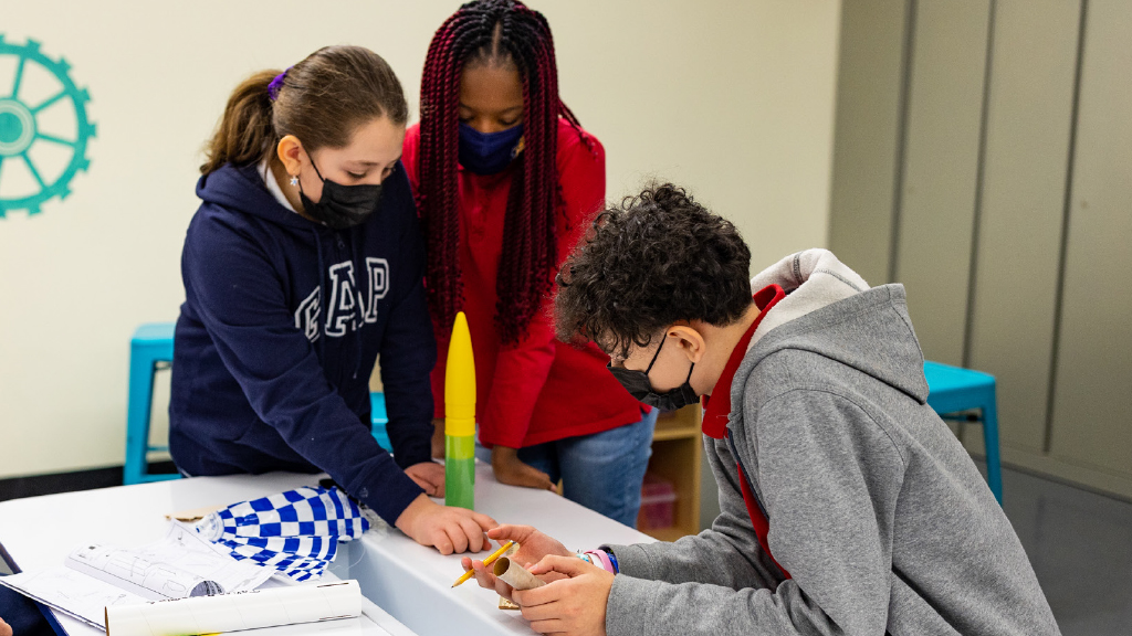 What force is pushing the model rocket up?