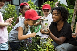 teacher with students outdoors