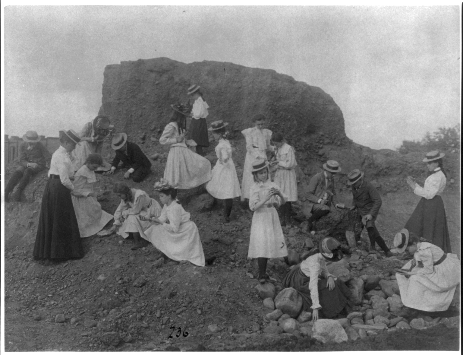 children examine rocks