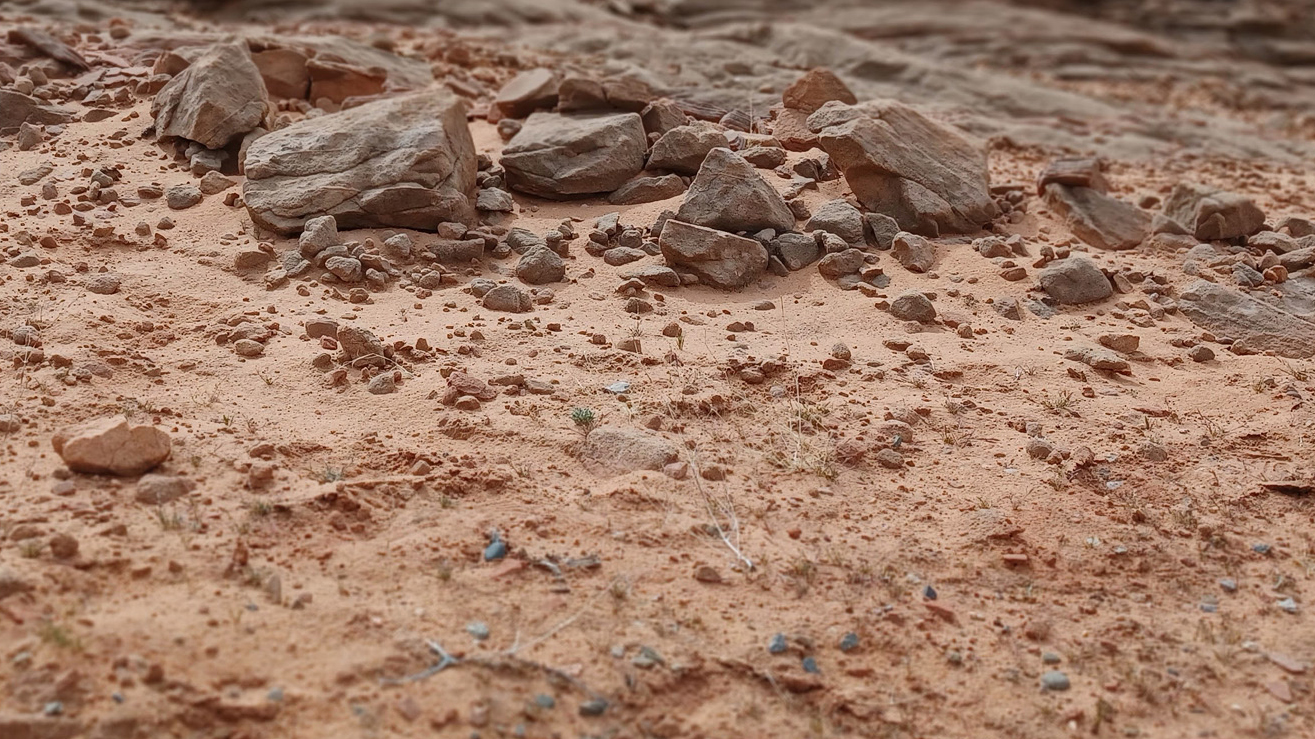 Figure 2 Weathering of rocks to sand and dust.