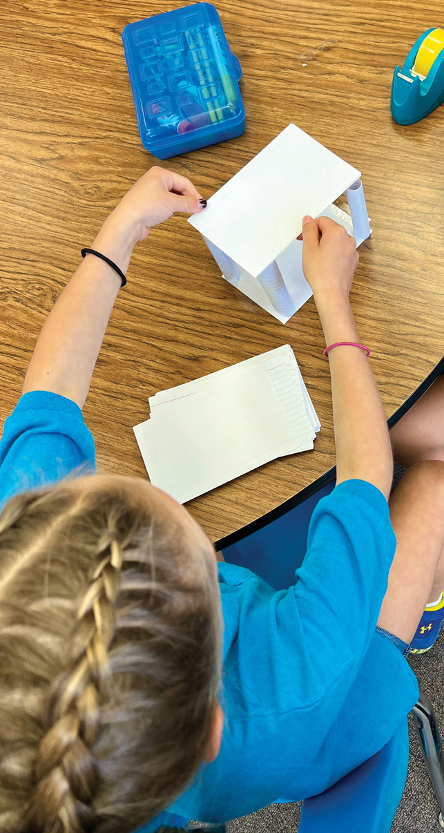 Figure 2  Students investigated methods to stabilize their structure in the wind.