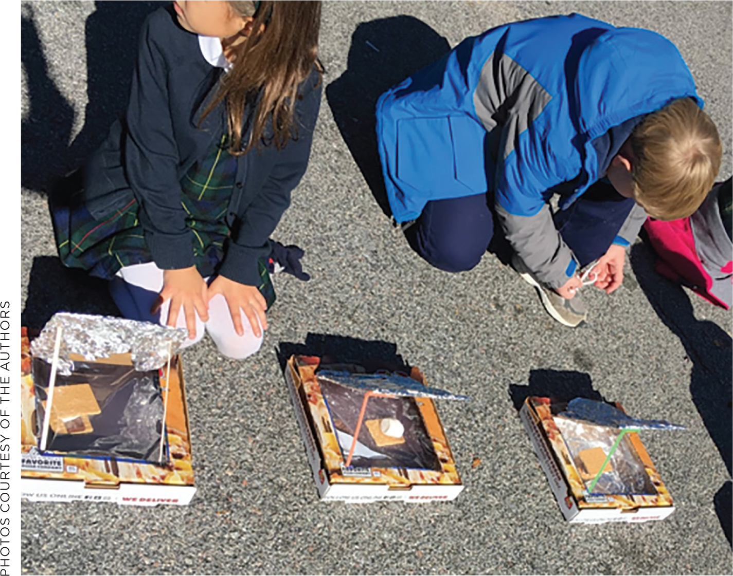 Students test solar ovens.