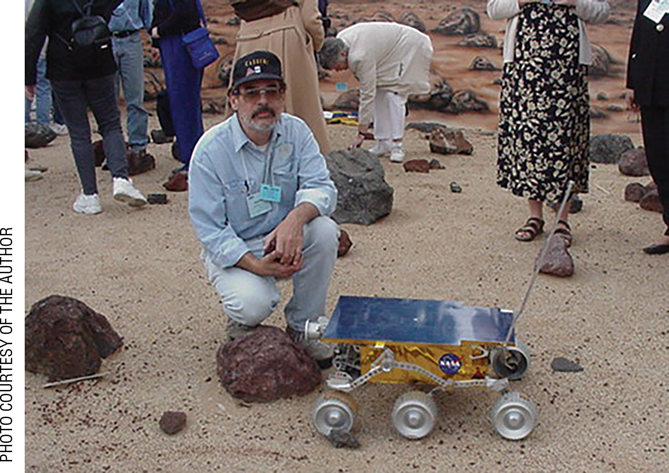 The author in the Mars In-Situ Lab with the Sojourner rover twin