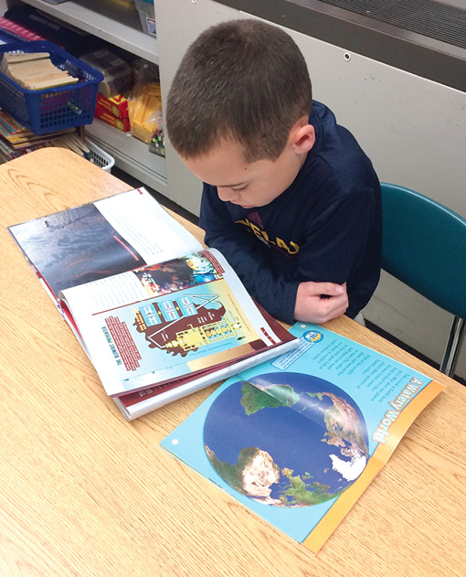 Students conducted research in the classroom library.